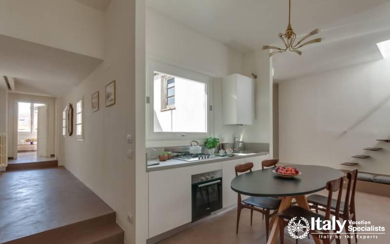 Kitchen and dinning area in Santa Maria Balcony