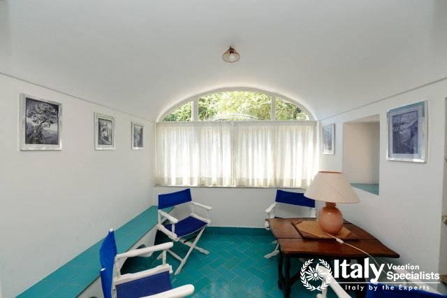 Blue chairs for sitting in Villa Tomeu