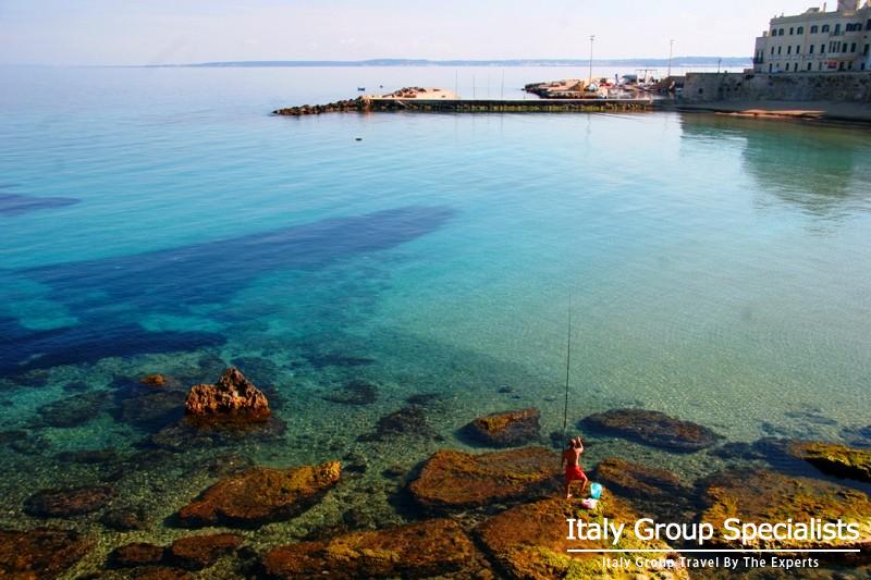 Fisherman in town of Gallipoli, Puglia, Italy - Photo by Jesse Andrews 