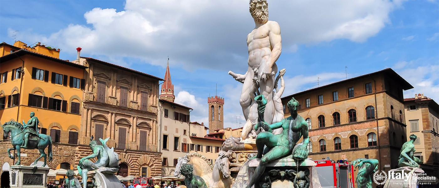 A historic square featuring the famous statue of Neptune in Florence