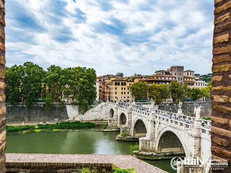 Rome, Italy - September 02, 2017view of people walk on St Angel Bridge from Castle of Holy Angel in 