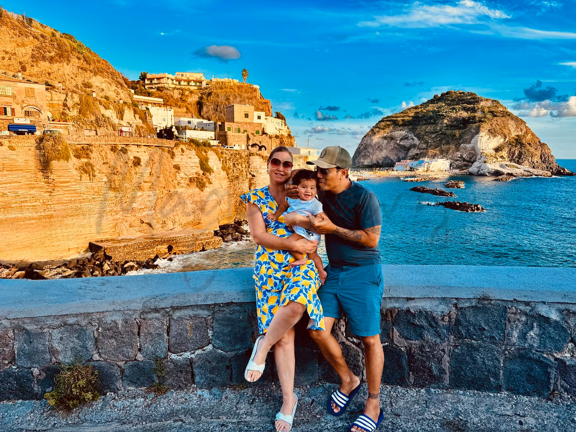 Jesse Andrews, founder of Italy Vacation Specialists, with her family on the Italian coast