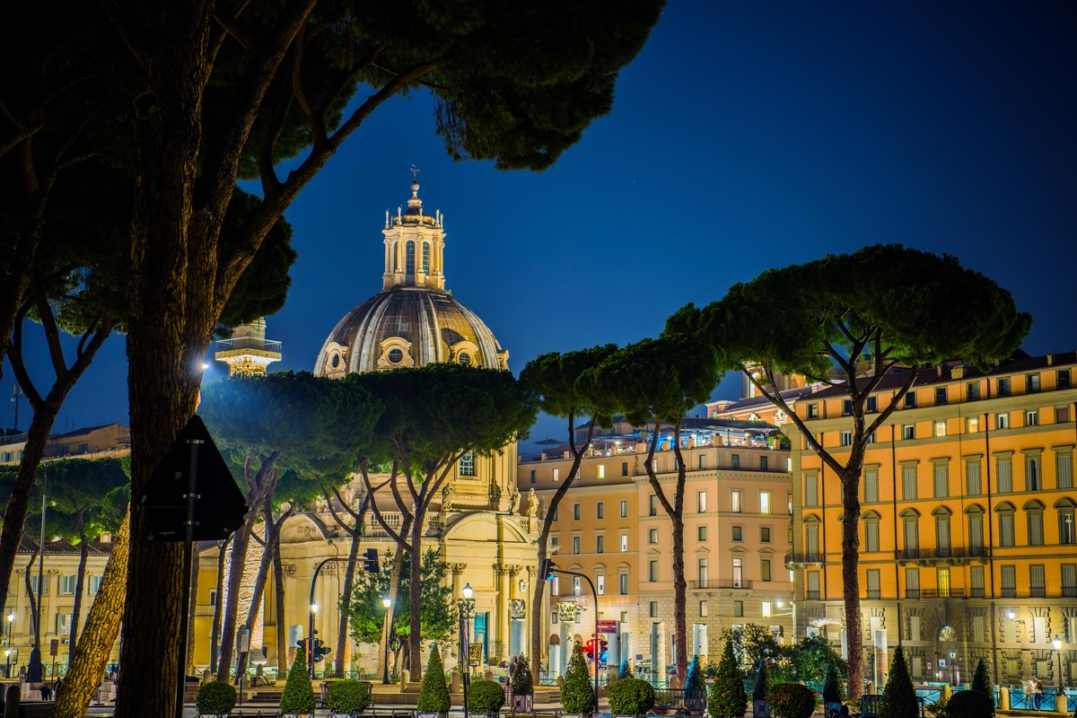 A street in Rome lit up at night
